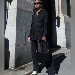 Black two piece set. Lightweight / crinkly